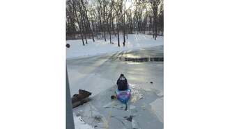 Fire Chief Rescues Dog From Frozen Lake in Wapello County