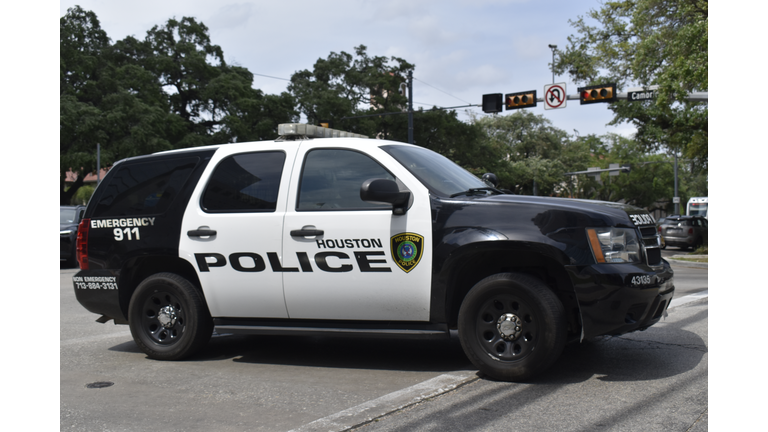 A portrait of a Pasadena Police Officer's Chevy Tahoe SUV