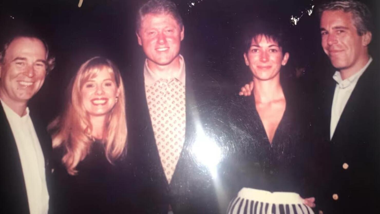Bill Clinton Poses For Photo with Jeffrey Epstein