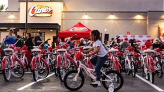 SSOTD: Flavor Flav and Raising Cane's Gift Bikes To Local Kids