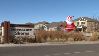 Colorado Neighbors Fight HOA to Keep 28-Foot Inflatable Santa