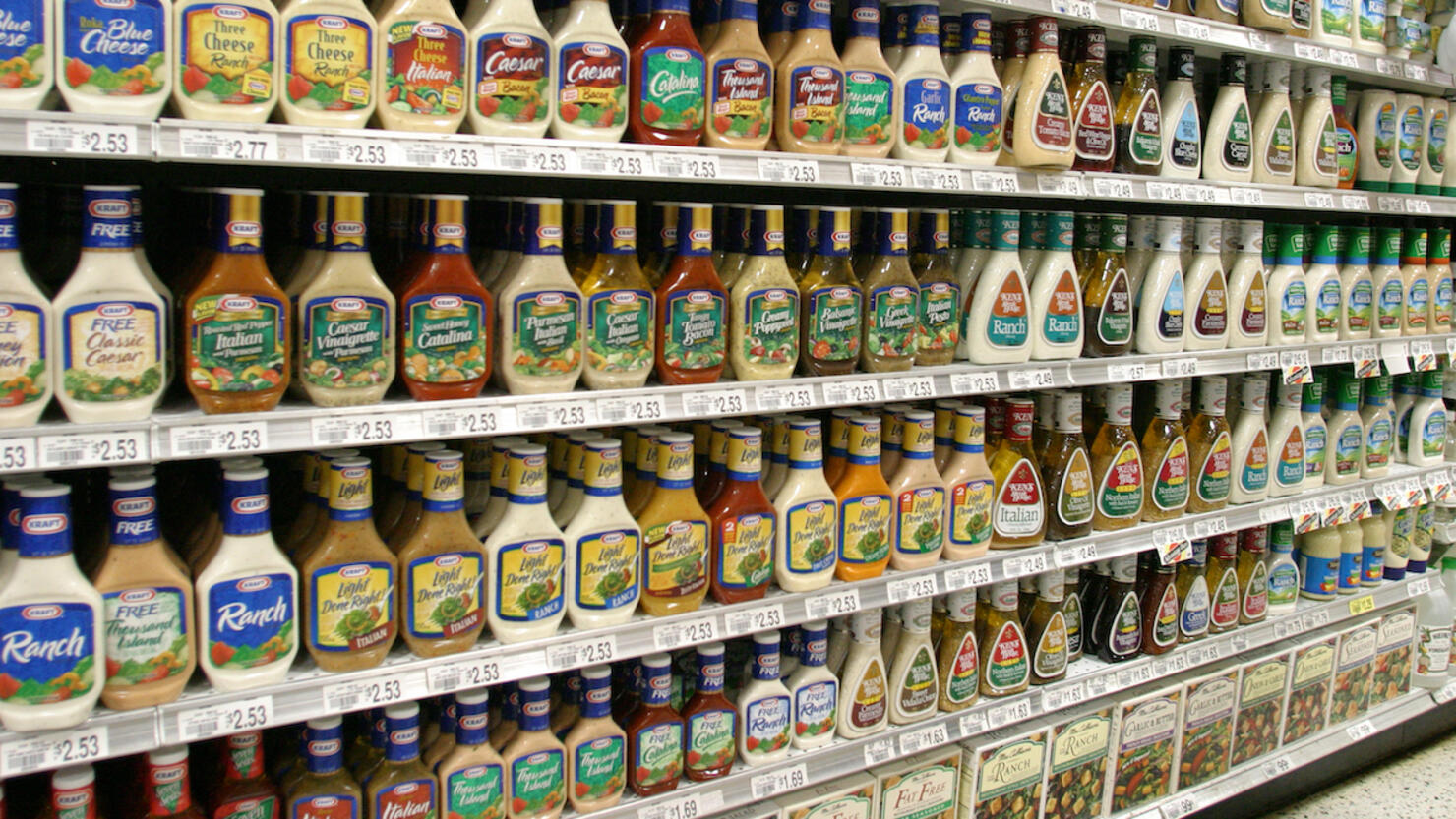 Shelves of salad dressings for sale in Publix Grocery Store.