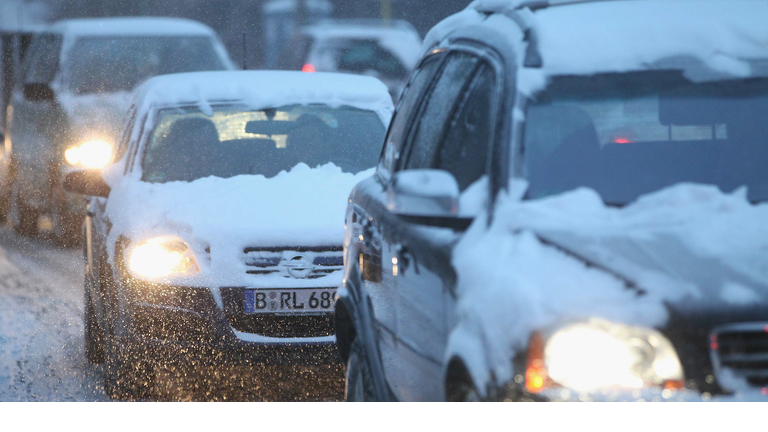 snow driving cars