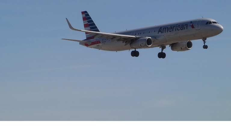 airplane air travel american airlines plane
