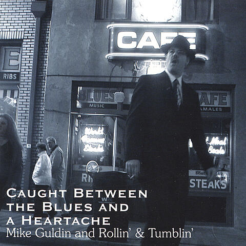 Caught Between The Blues And A Heartache