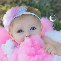 Fluffy Delight in Tiny Hands
