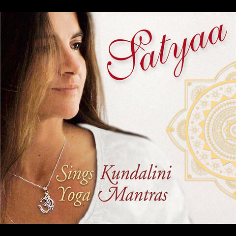 Sings Kundalini Yoga Mantras