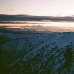 Falling Sleet Defines a Granite Dome