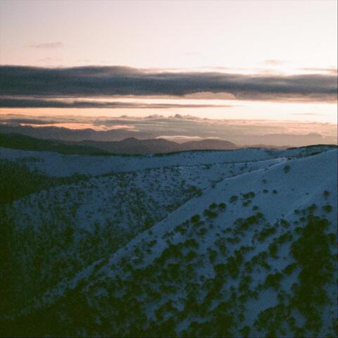 Falling Sleet Defines a Granite Dome