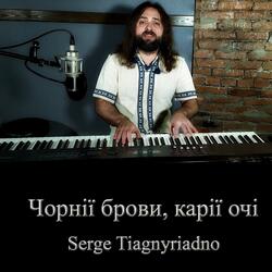 Чорнії брови, карії очі
