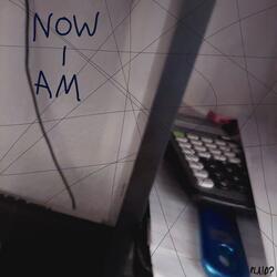 NOW I AM