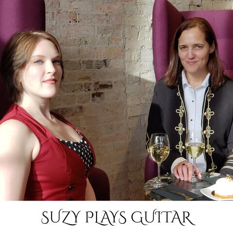 Suzy Plays Guitar
