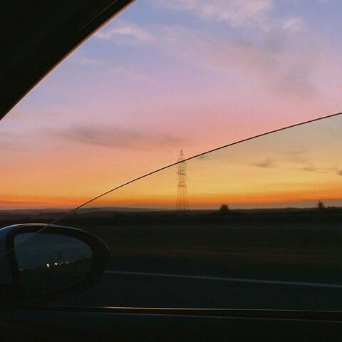 driving in the sunset