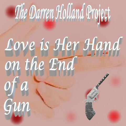 Love Is Her Hand On The End Of A Gun