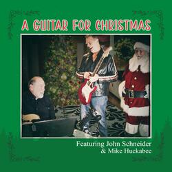 A Guitar For Christmas (feat. Mike Huckabee)