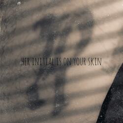 her initial is on your skin