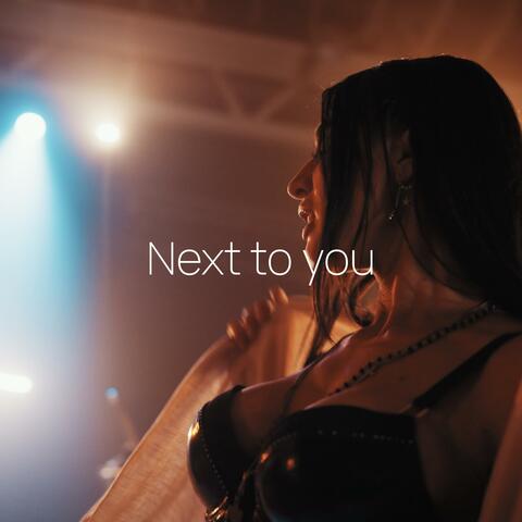 Next to you