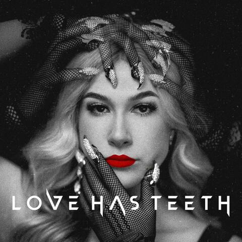 LOVE HAS TEETH