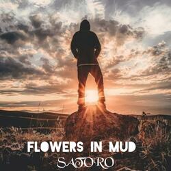 Flowers In Mud