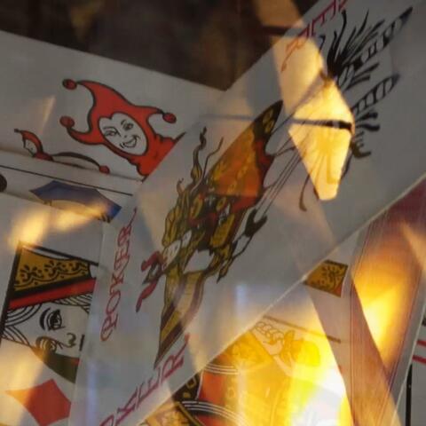 BURNING HOUSE OF CARDS