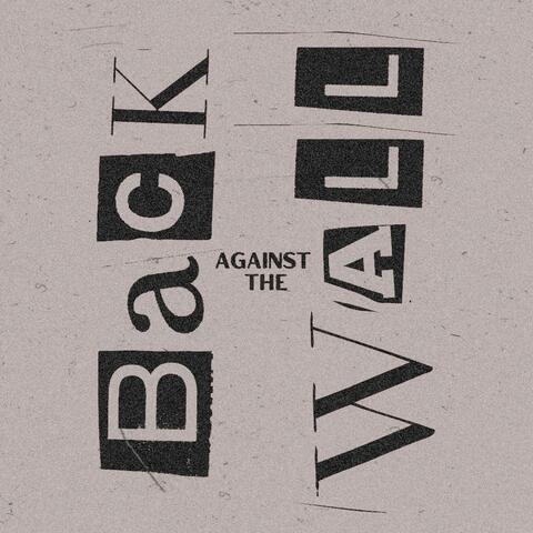 Back against the wall