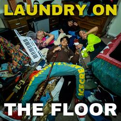 LAUNDRY ON THE FLOOR