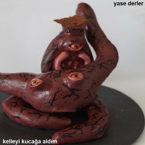 kelleyi kucağa aldım