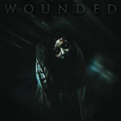 Wounded (feat. Travis Worland & Enterprise Earth)