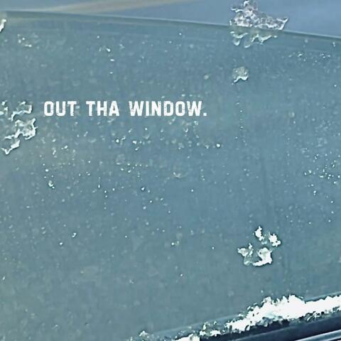 out tha window.