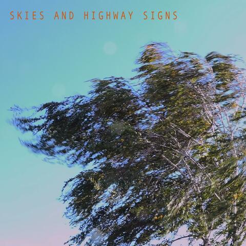 Skies and Highway Signs