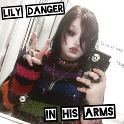 In his arms