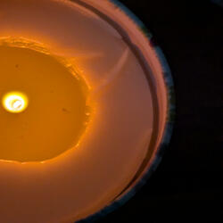 By The Candle Light