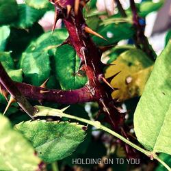 HOLDING ON TO YOU