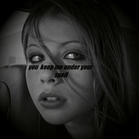 UNDER YOUR SPELL