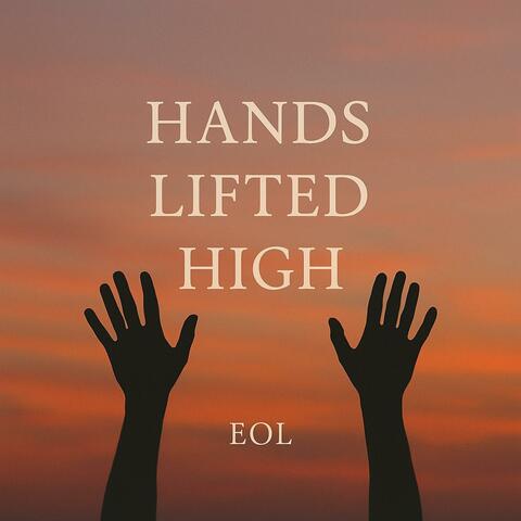Hands lifted high