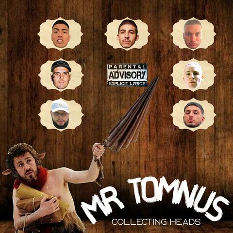 MR TOMNUS (collecting heads)