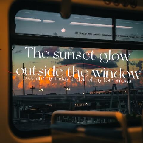 The sunset glow outside the window