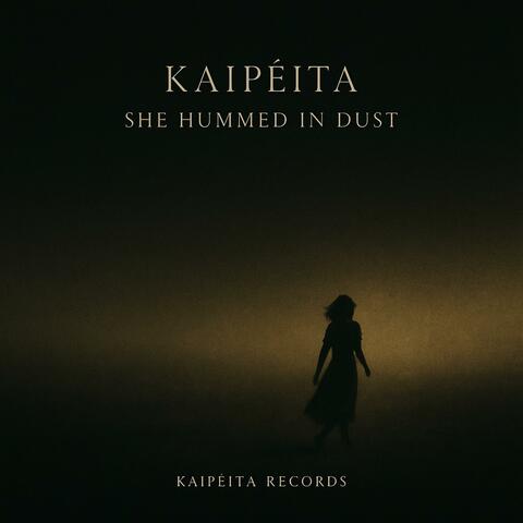 She Hummed in Dust