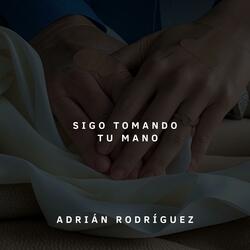 Sigo tomando tu mano