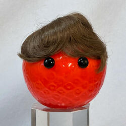 Orange in a Toupee