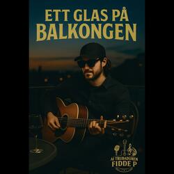 Ett glas på balkongen