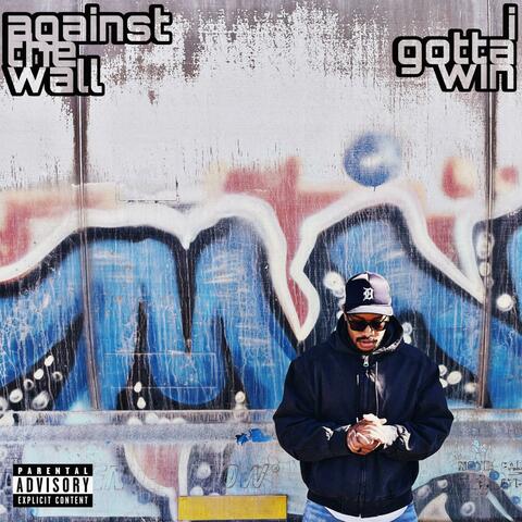 against the wall. i gotta win.