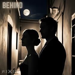 Behind