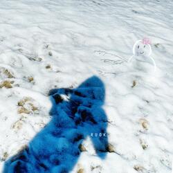 Sunbathing Snowman
