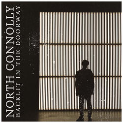 Backlit in the doorway