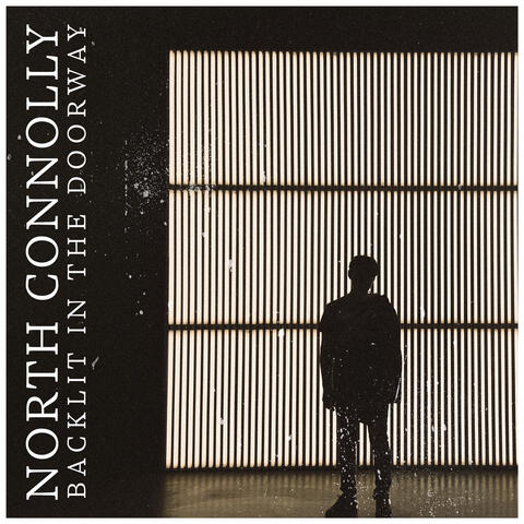 Backlit in the doorway