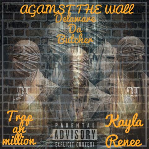 Against the wall