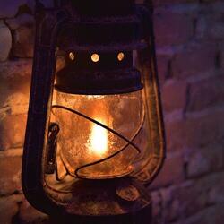 Sleep in a Refuge: Kerosene Lamp in Storm