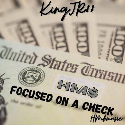 Focused on a Check
