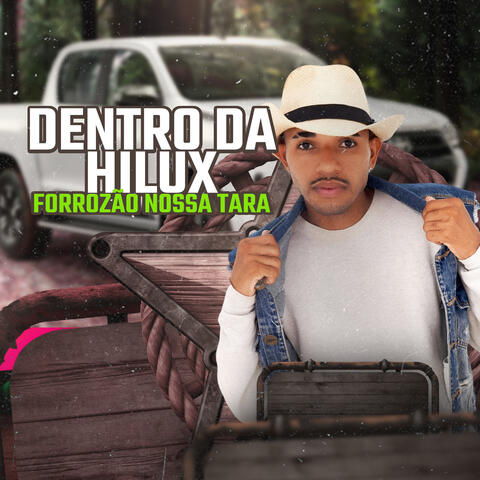 Dentro da Hilux